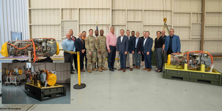 military and business personnel in aircraft hangar with inset of engines